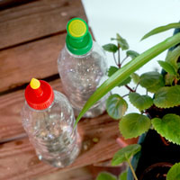 Set med stril och dusch för bevattning med petflaska