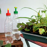 Set med stril och dusch för bevattning med petflaska